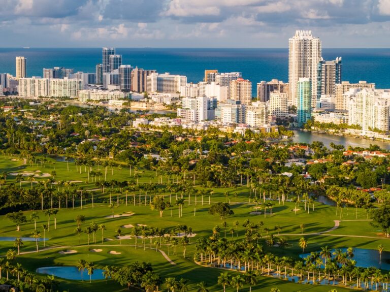 Beautiful colorful aerial photo Miami Beach golf and condominium buildings