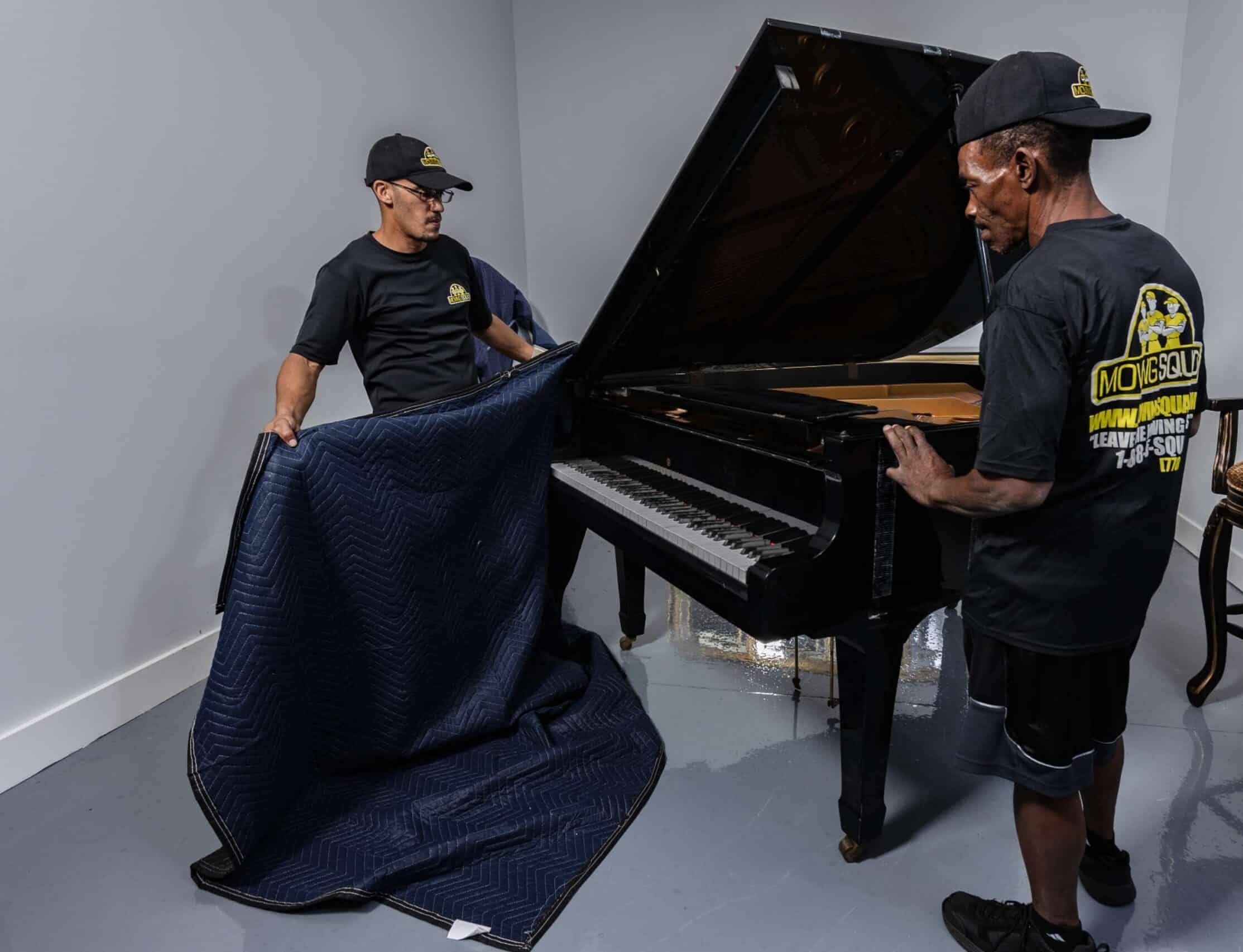 https://movingsquad.com/wp-content/uploads/sites/8/2024/04/piano-movers.jpg